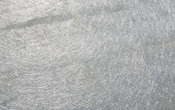 Rishangles laminate fibreglass or shingles?