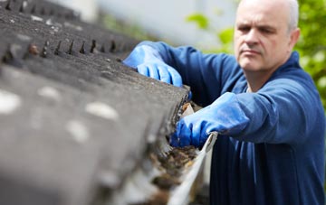 cleaning and inspecting Rishangles roofs